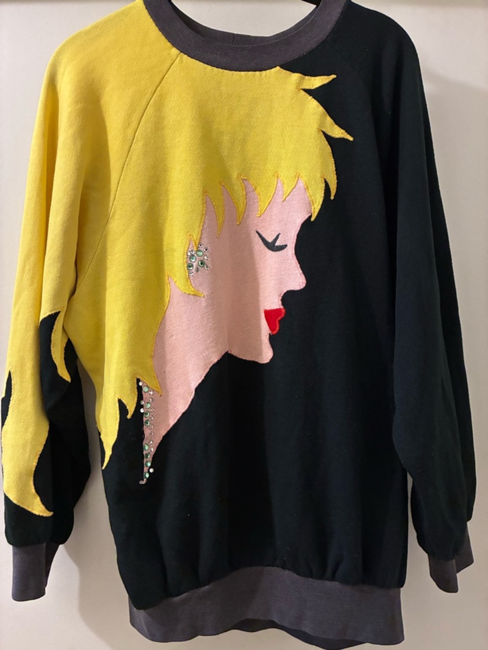 Vintage 1980s Black Sweatshirt with Yellow Graphic Profile